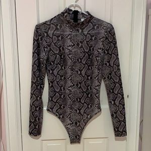 Tigermist never worn semi sheer shiny bodysuit